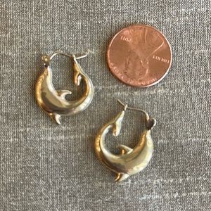 14K gold.  Solid. Yellow. 1.03 grams.  Dolphin hoop earrings